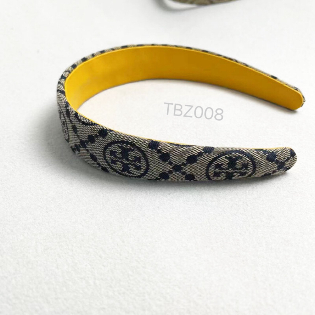 Tory Burch(トリーバーチ)のTBZ008B3トリーバーチTory Burch  定番　カチューシャ レディースのヘアアクセサリー(カチューシャ)の商品写真