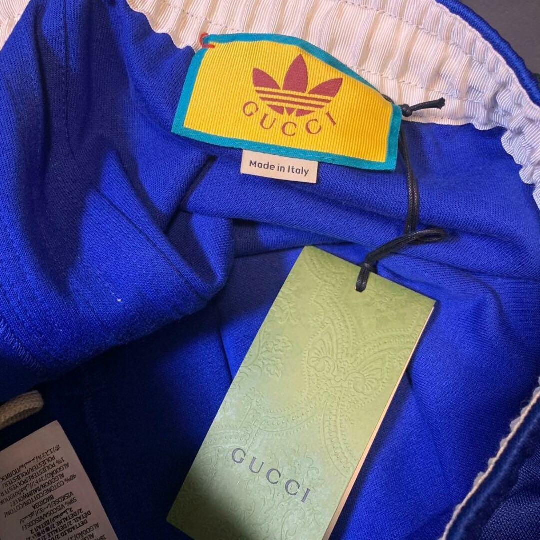 Gucci(グッチ)のadidas x Gucci コラボ フレア ジョギングパンツ ブルー  M メンズのパンツ(その他)の商品写真