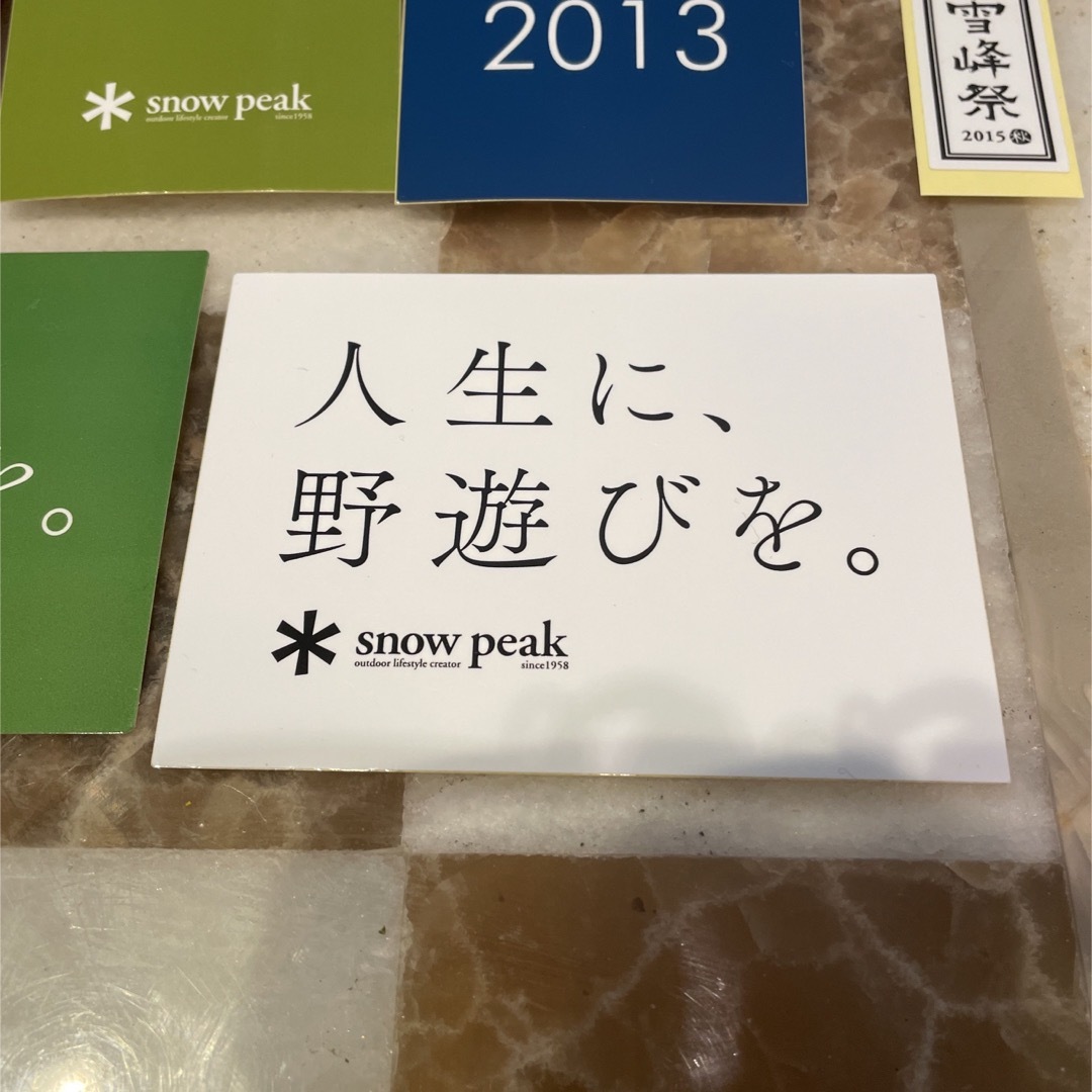 Snow Peak(スノーピーク)の【激レア新品】snowpeak  雪峰祭限定品　手ぬぐいとステッカー7枚セット スポーツ/アウトドアのアウトドア(その他)の商品写真