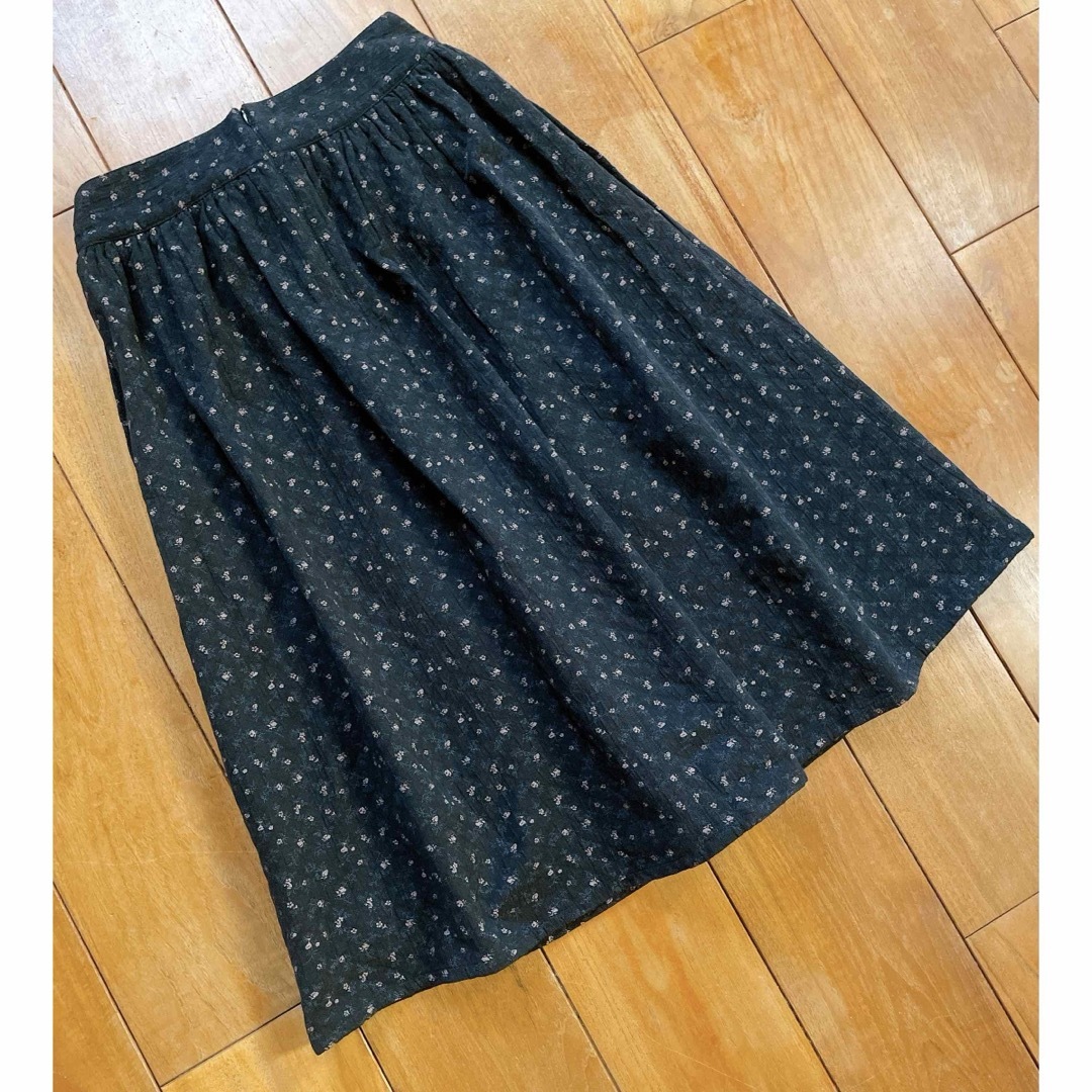 COACH(コーチ)の美品COACH キルトスカート　ブラック　花柄　ビンテージデザイン　2 レディースのスカート(ひざ丈スカート)の商品写真