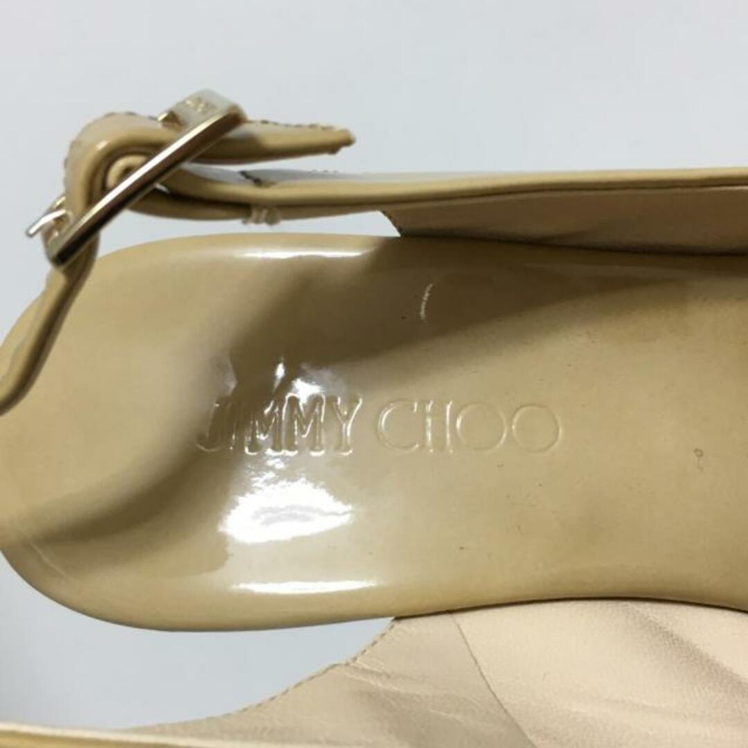 JIMMY CHOO(ジミーチュウ)のJIMMY CHOO(ジミーチュウ) サンダル 36 レディース - ベージュ ウェッジソール/オープントゥ エナメル（レザー） レディースの靴/シューズ(サンダル)の商品写真