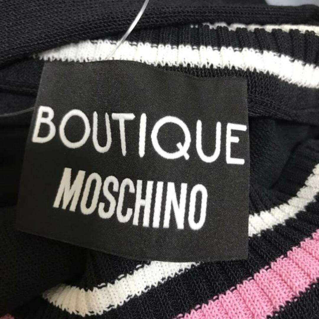 MOSCHINO(モスキーノ)のMOSCHINO(モスキーノ) チュニック レディース - 黒×白×ピンク Vネック/半袖/ニット/BOUTIQUE レディースのトップス(チュニック)の商品写真