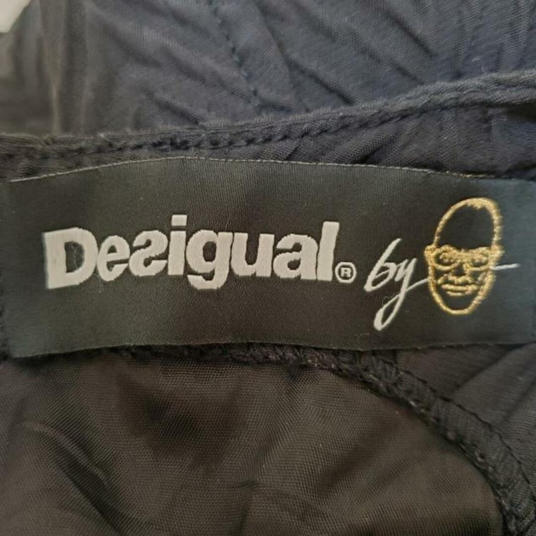 DESIGUAL(デシグアル)のDesigual(デシグアル) ワンピース サイズ38 L レディース美品  - 黒×白 クルーネック/ノースリーブ/ひざ丈 レディースのワンピース(その他)の商品写真