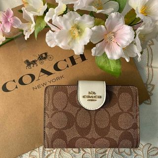 COACH 二つ折り ベージュ シグネチャー ホワイト ベルトロゴ(財布)