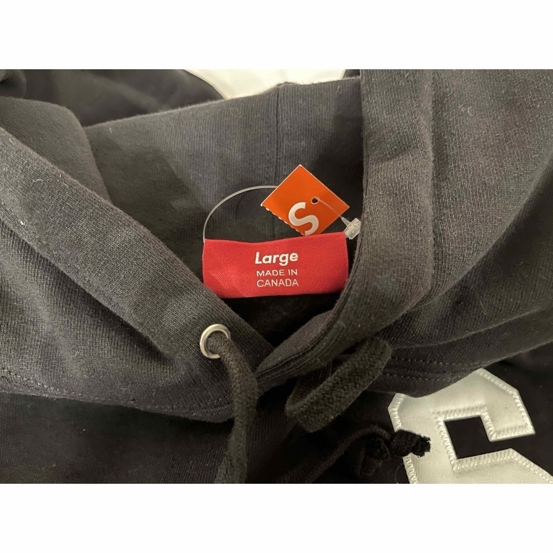 Supreme(シュプリーム)のSupreme $ Hooded Sweatshirt black large メンズのトップス(パーカー)の商品写真