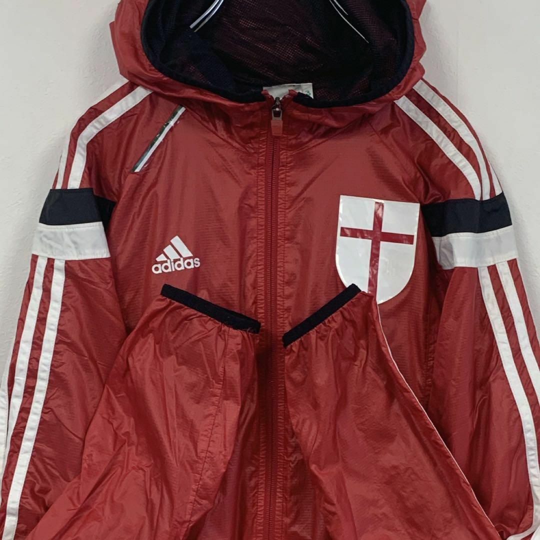 adidas(アディダス)のadidas トラックジャケット RED 長袖 ウィンドブレーカー Mサイズ スポーツ/アウトドアのサッカー/フットサル(ウェア)の商品写真