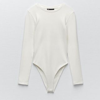 ザラ(ZARA)のZARA リブ地ボディースーツ　オフホワイト(カットソー(長袖/七分))