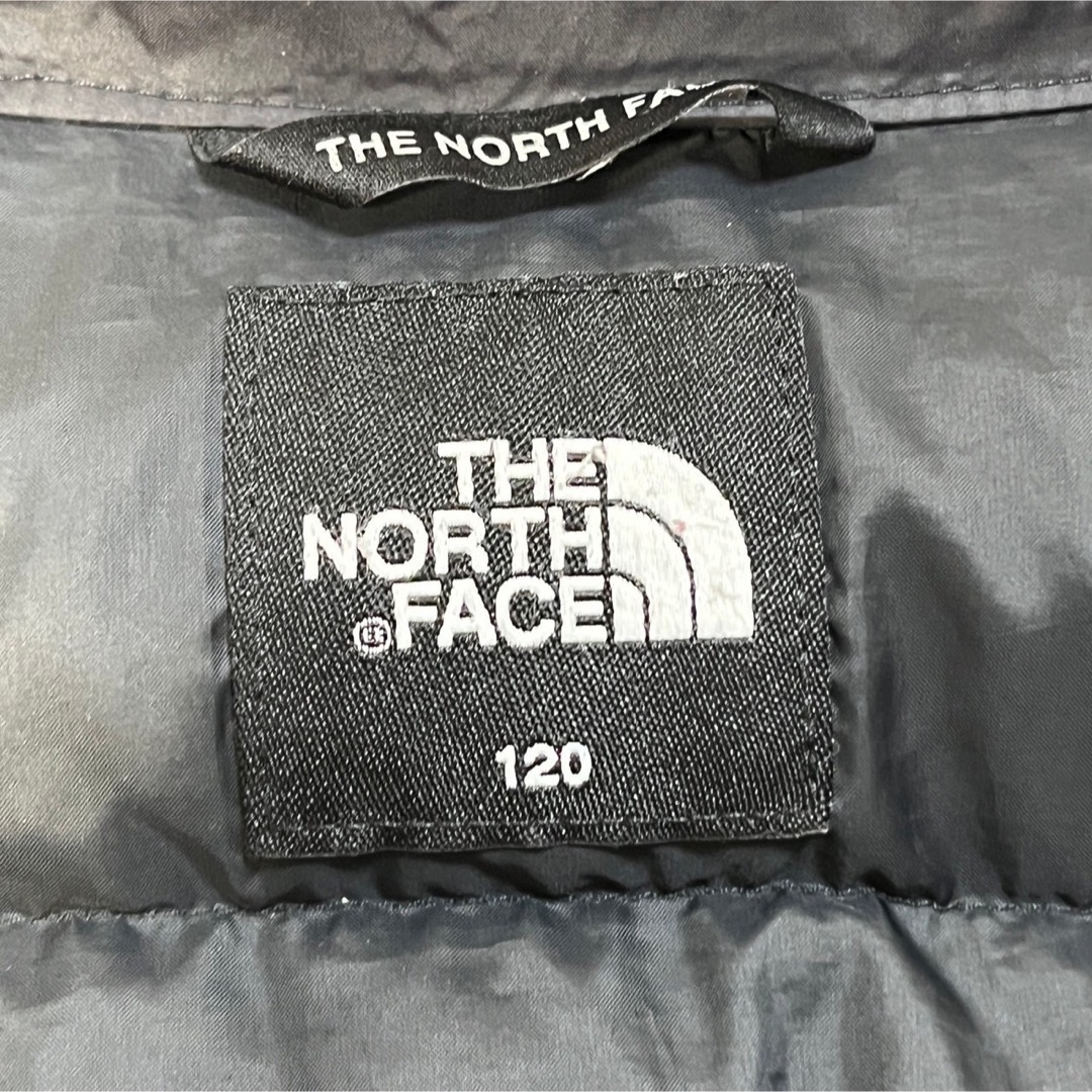 THE NORTH FACE(ザノースフェイス)のノースフェイス】パディングベスト ブラック　キッズ子供120　刺繍TBALL１K キッズ/ベビー/マタニティのキッズ服男の子用(90cm~)(ジャケット/上着)の商品写真