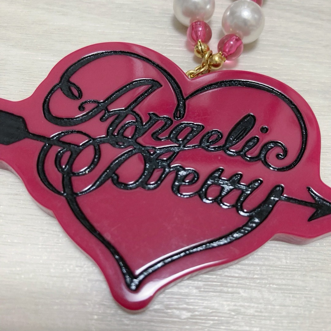 Angelic Pretty(アンジェリックプリティー)の⚠️最終値下げ⚠️Dollyアローネックレス/ワイン レディースのアクセサリー(ネックレス)の商品写真