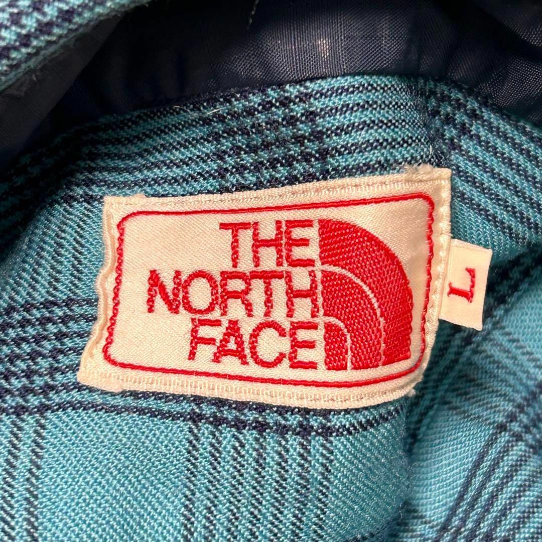 THE NORTH FACE(ザノースフェイス)の【THE NORTH FACE】ウールフランネルチェックシャツ　日本製　ブルーL レディースのトップス(シャツ/ブラウス(長袖/七分))の商品写真