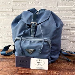 プラダ ナイロン×レザー 三角プレートロゴ リュック バックパック ブルー | フリマアプリ ラクマ プラダ ナイロン×レザー 三角プレートロゴ リュック バックパック ブルー | フリマアプリ ラクマ