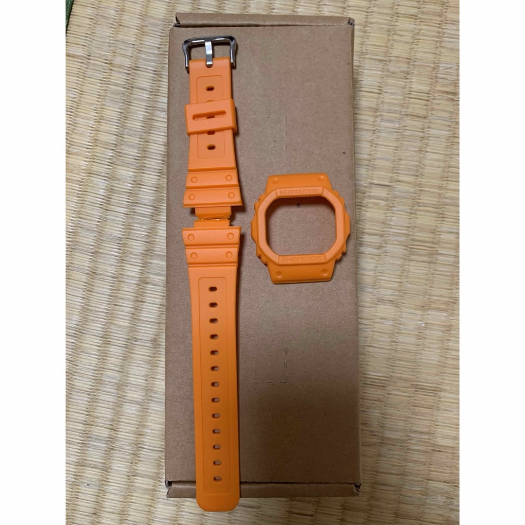 DW-5600系　ベルベゼ　ベゼル　ベルト　オレンジ　ELスピード　バンド メンズの時計(ラバーベルト)の商品写真