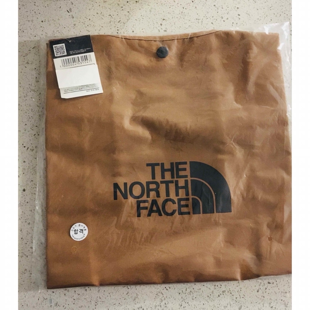 THE NORTH FACE(ザノースフェイス)のクリアバッグとキャメル レディースのバッグ(エコバッグ)の商品写真