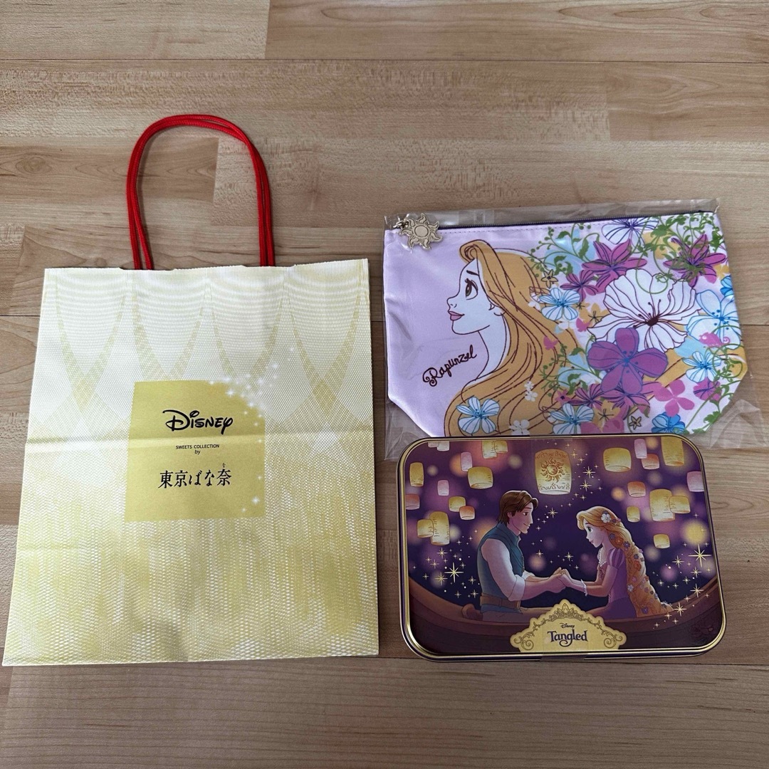 Disney(ディズニー)のディズニー　東京ばな奈　コラボ缶　ポーチ　ラプンツェル エンタメ/ホビーのおもちゃ/ぬいぐるみ(キャラクターグッズ)の商品写真