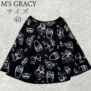 エムズグレイシー(M'S GRACY)のエムズグレイシー　人気　カメリア　リボン　バック柄　40 ブラック　フレア(ひざ丈スカート)