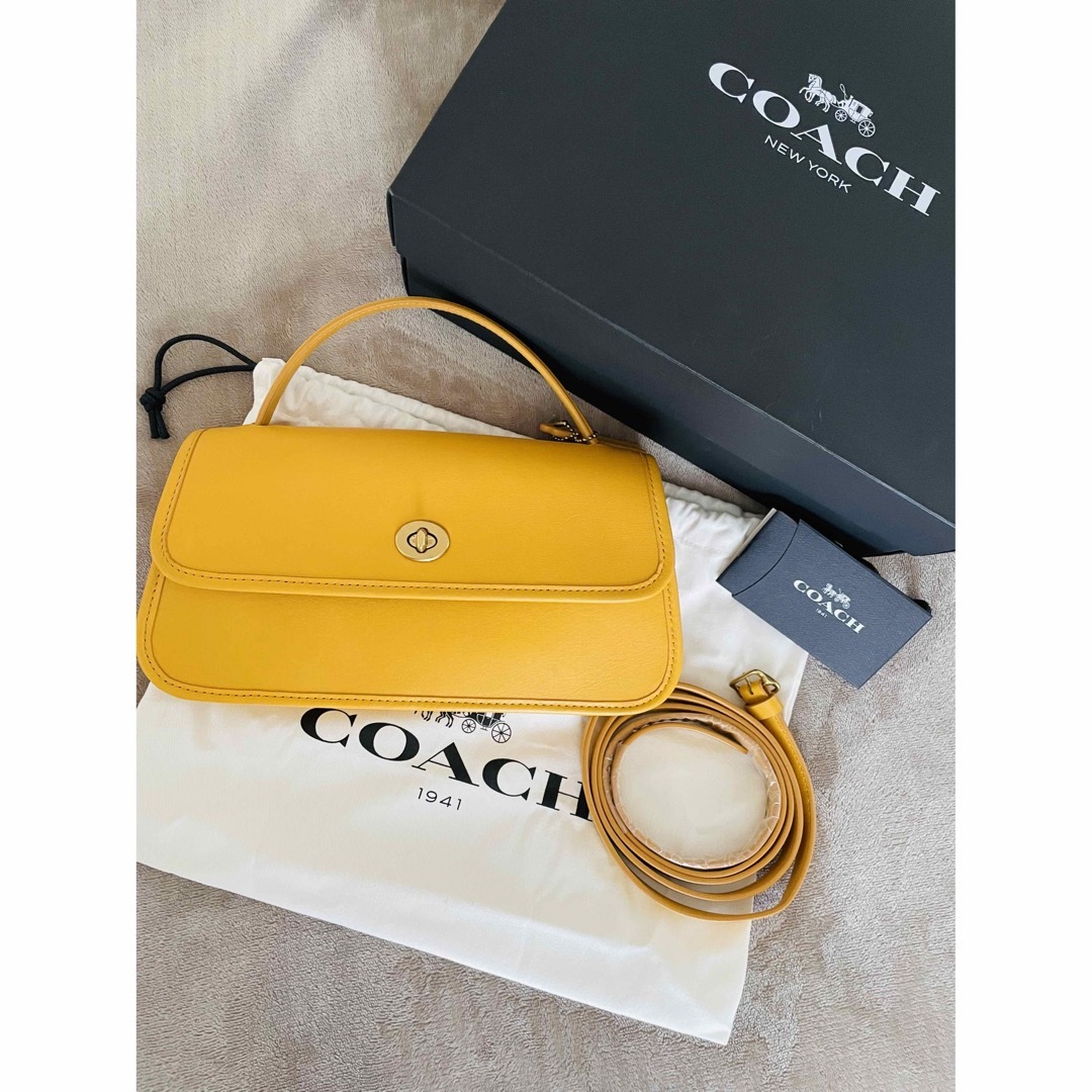 COACH(コーチ)の【COACH】ターンロッククラッチバッグ【新品未使用】 レディースのバッグ(クラッチバッグ)の商品写真