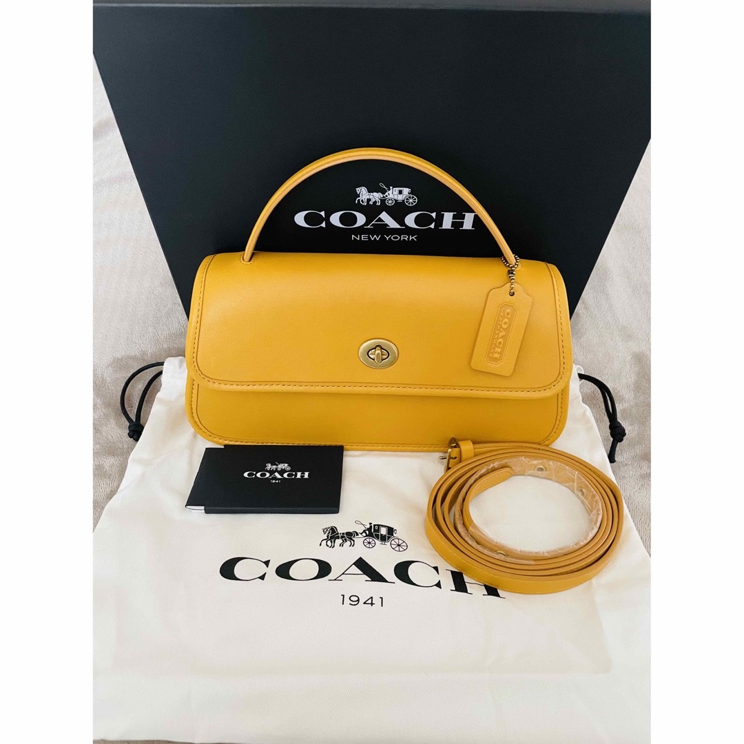 COACH(コーチ)の【COACH】ターンロッククラッチバッグ【新品未使用】 レディースのバッグ(クラッチバッグ)の商品写真