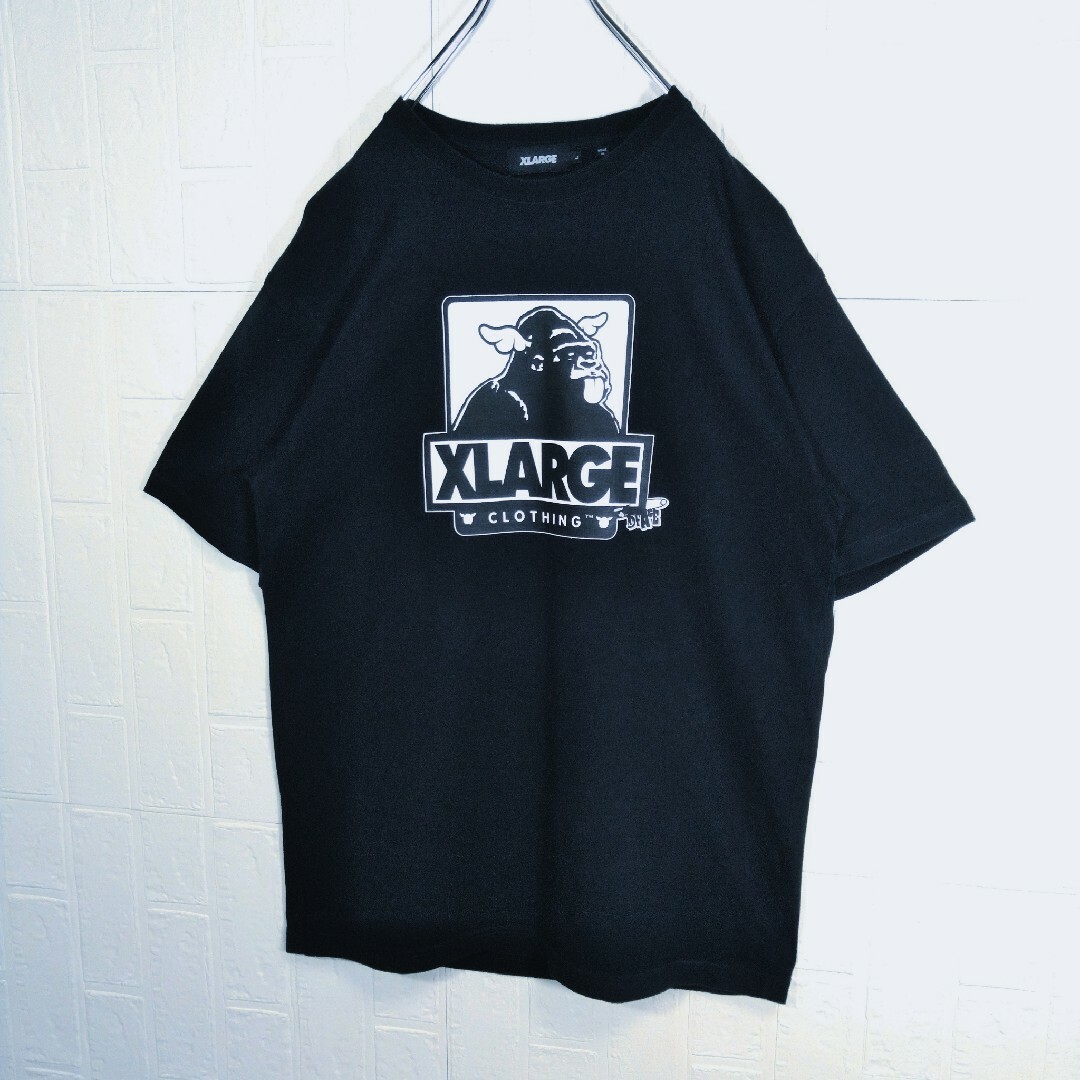 XLARGE(エクストララージ)の《X-LARGE》ディーフェイス コラボ 　Tシャツ　ロゴプリント　半袖 メンズのトップス(Tシャツ/カットソー(半袖/袖なし))の商品写真