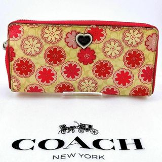 コーチ(COACH)のコーチ シグネチャー フローラルプリント ジップウォレット ピンク(財布)