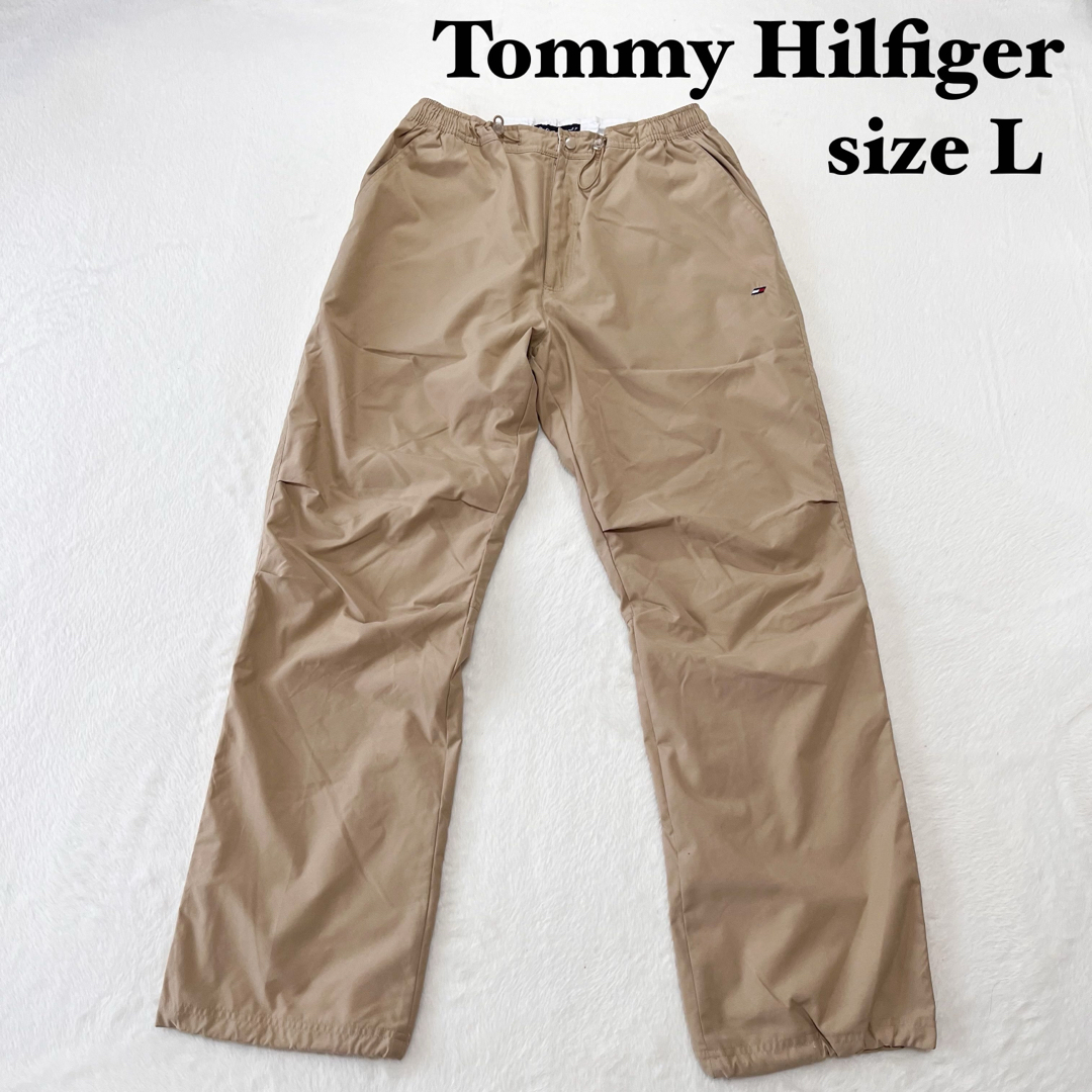 TOMMY HILFIGER(トミーヒルフィガー)のトミーヒルフィガー　スポーツ　パラシュートズボン　ナイロン　ベージュ　サイズL メンズのパンツ(その他)の商品写真