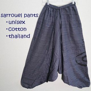 【新品】ぐるぐる柄のゆったりコットンサルエルパンツ　ネイビー系(サルエルパンツ)