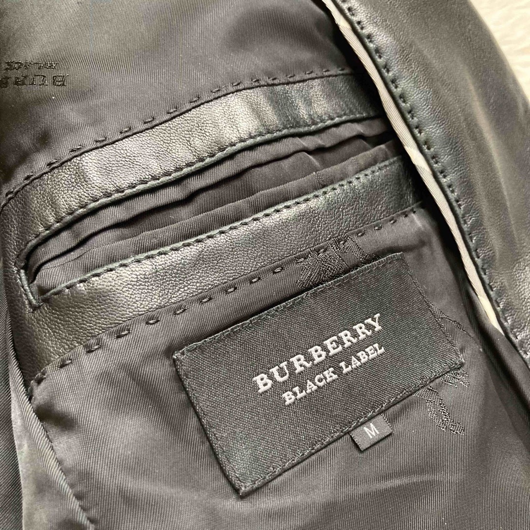 BURBERRY BLACK LABEL(バーバリーブラックレーベル)のバーバリーブラックレーベル 羊革 テーラードジャケット 裏地ホースロゴ 黒 M メンズのジャケット/アウター(テーラードジャケット)の商品写真