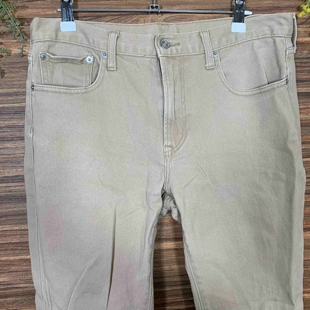 GU(ジーユー)のGU ジーユー パンツ ズボン Lサイズ相当 ベージュ 無地 メンズのパンツ(チノパン)の商品写真