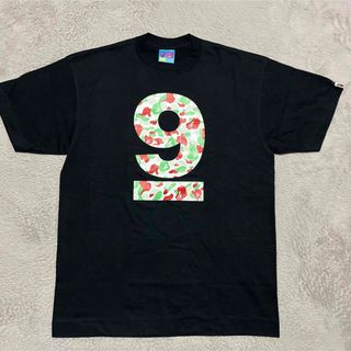 アベイシングエイプ(A BATHING APE)のAPE BAPE KAWS 仙台限定　tシャツ　CAMO 迷彩　LIMITED(Tシャツ/カットソー(半袖/袖なし))