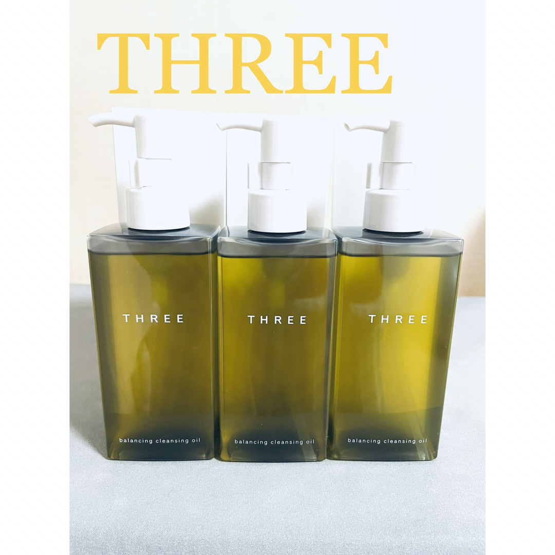 THREE(スリー)の【新品】THREEクレンジングオイル (3本)&ヘアトリートメント(1本) コスメ/美容のスキンケア/基礎化粧品(クレンジング/メイク落とし)の商品写真