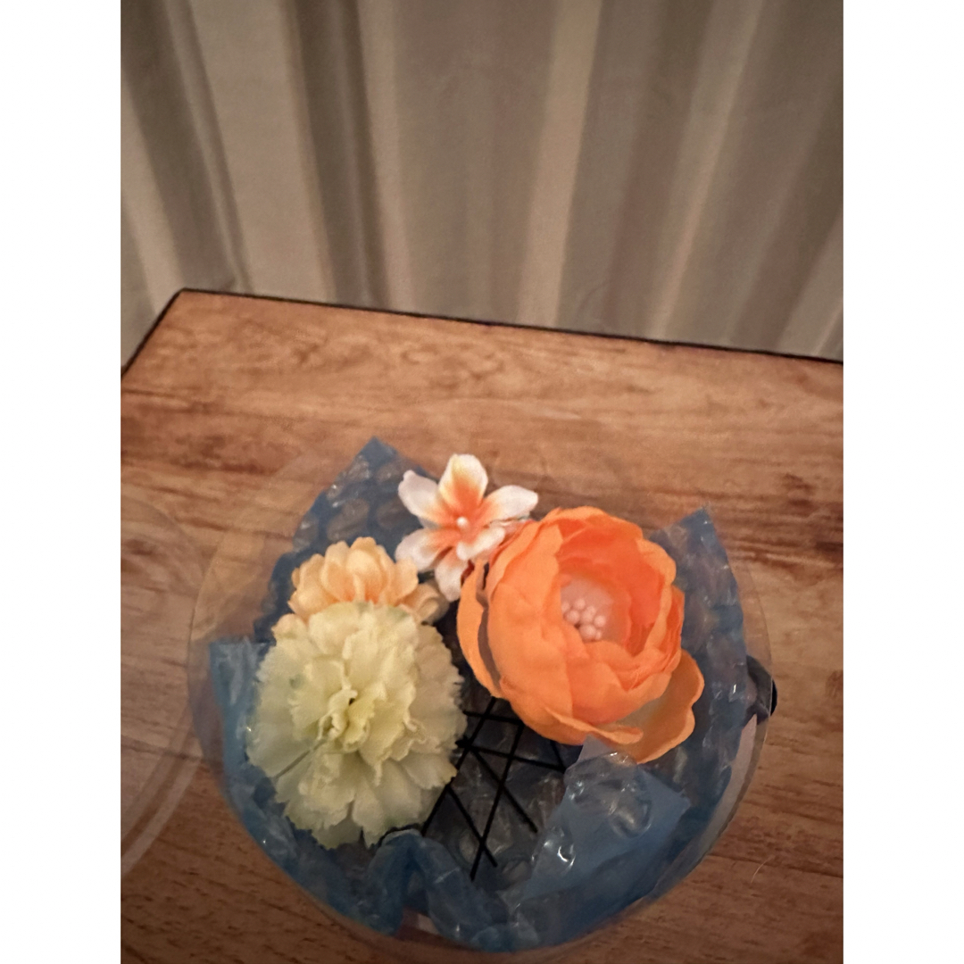 しまむら(シマムラ)の新品未使用　和装用　花飾り　オレンジ　黄色 レディースの水着/浴衣(和装小物)の商品写真