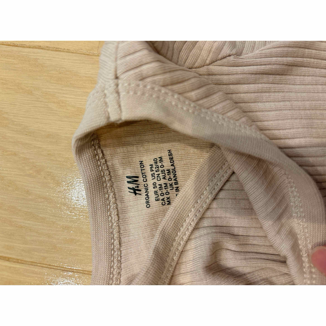 H&M(エイチアンドエム)の未使用　ベビー服 キッズ/ベビー/マタニティのベビー服(~85cm)(ロンパース)の商品写真