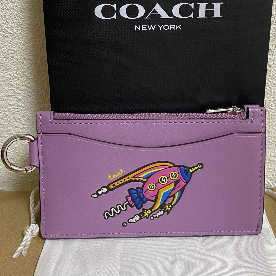 COACH(コーチ)の【極美品】coach コーチ  コズミック ジップ カードケース ロケット  紫 レディースのファッション小物(パスケース/IDカードホルダー)の商品写真