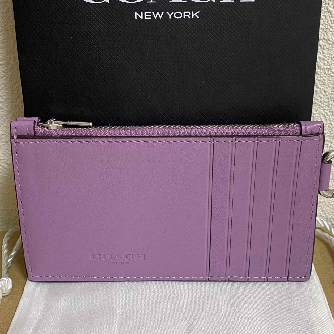 COACH(コーチ)の【極美品】coach コーチ  コズミック ジップ カードケース ロケット  紫 レディースのファッション小物(パスケース/IDカードホルダー)の商品写真