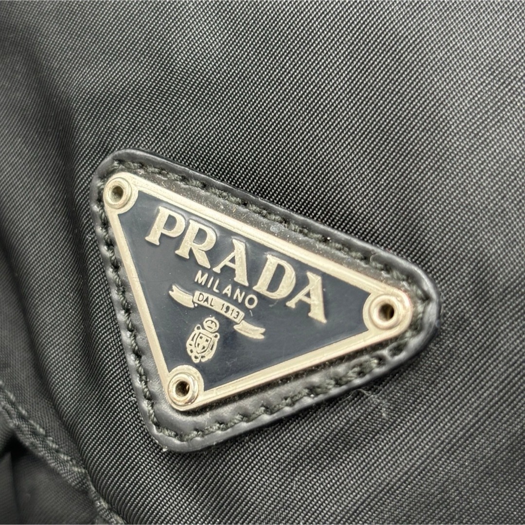 PRADA(プラダ)の75プラダ　バッグパック　リュック ナイロン　ブラック　白タグ　三角ロゴ レディースのバッグ(リュック/バックパック)の商品写真