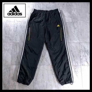 アディダス(adidas)の00s 古着 adidas 中綿 ナイロンパンツ 黒 黄色 XL ドローコード(その他)