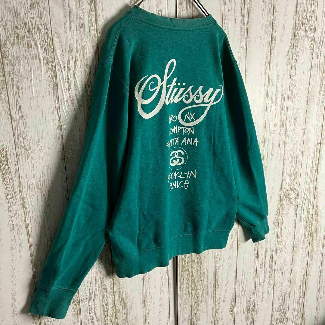 STUSSY(ステューシー)の【希少カラー】ステューシー☆ワールドツアー両面プリント 入手困難 即完売モデル メンズのトップス(スウェット)の商品写真