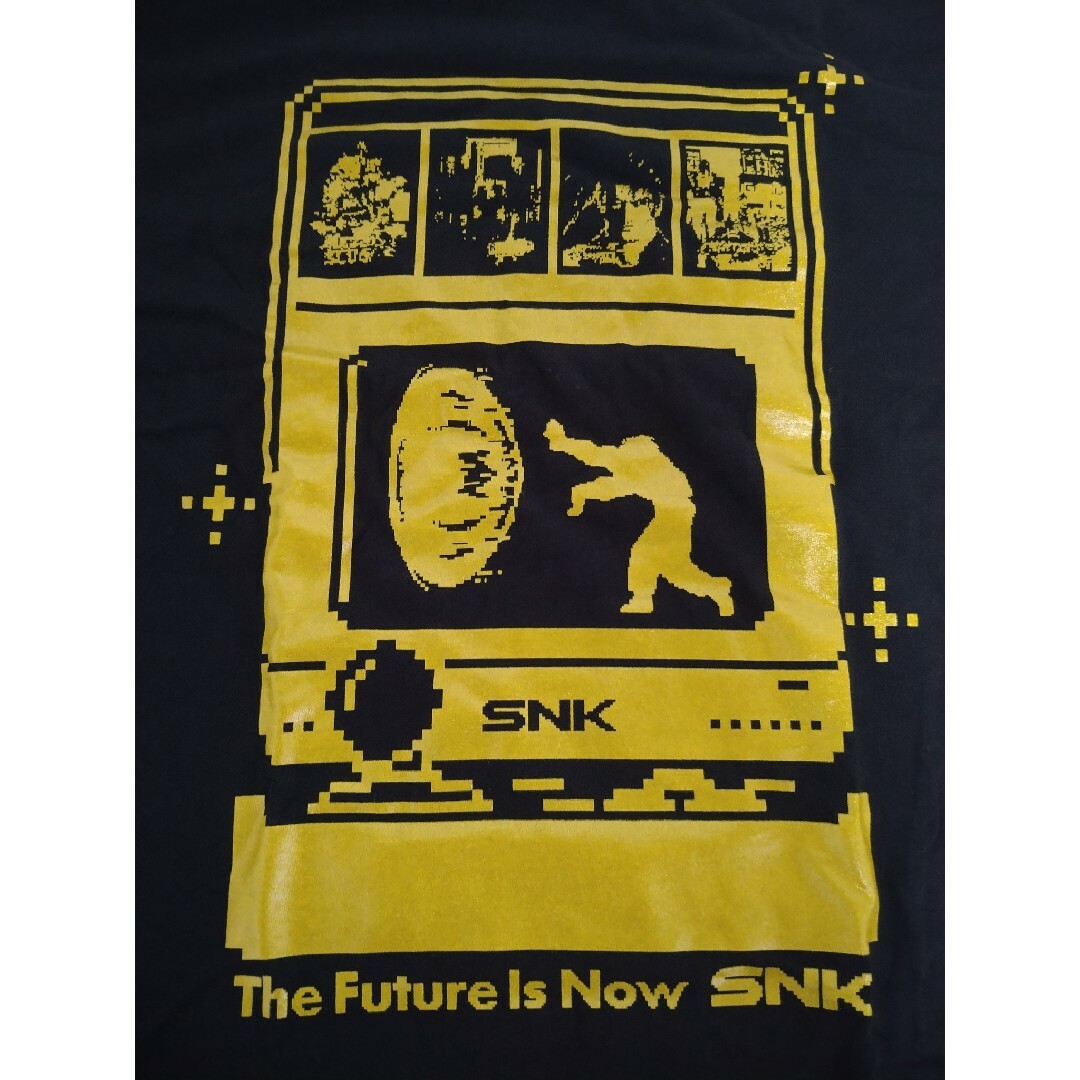 NEOGEO(ネオジオ)の新品ネオジオミニ snk 未使用 ティーシャツ L エンタメ/ホビーのゲームソフト/ゲーム機本体(家庭用ゲーム機本体)の商品写真