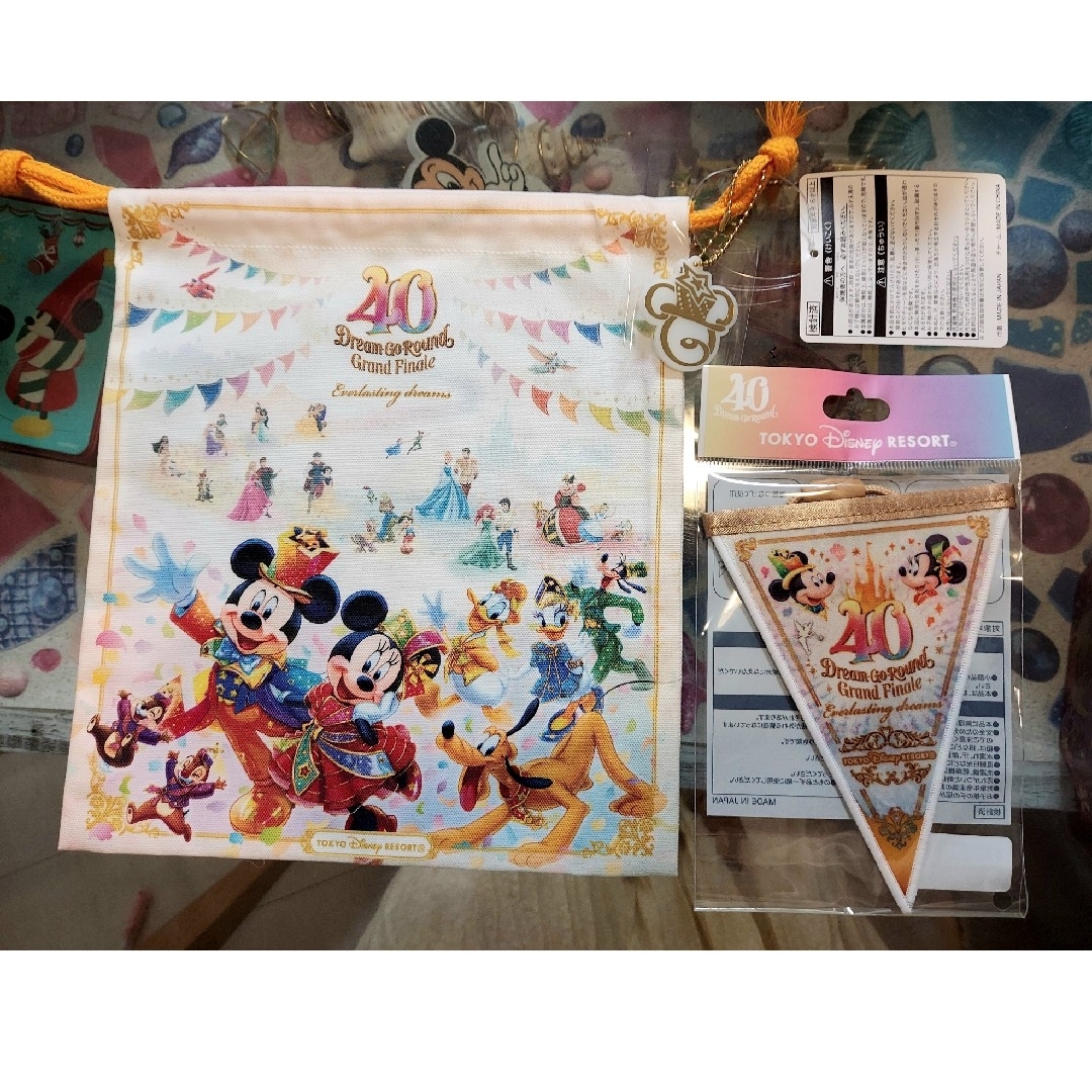 Disney(ディズニー)のディズニー40周年　グランドフィナーレ　きんちゃく　&　ガーランド　セット エンタメ/ホビーのおもちゃ/ぬいぐるみ(キャラクターグッズ)の商品写真