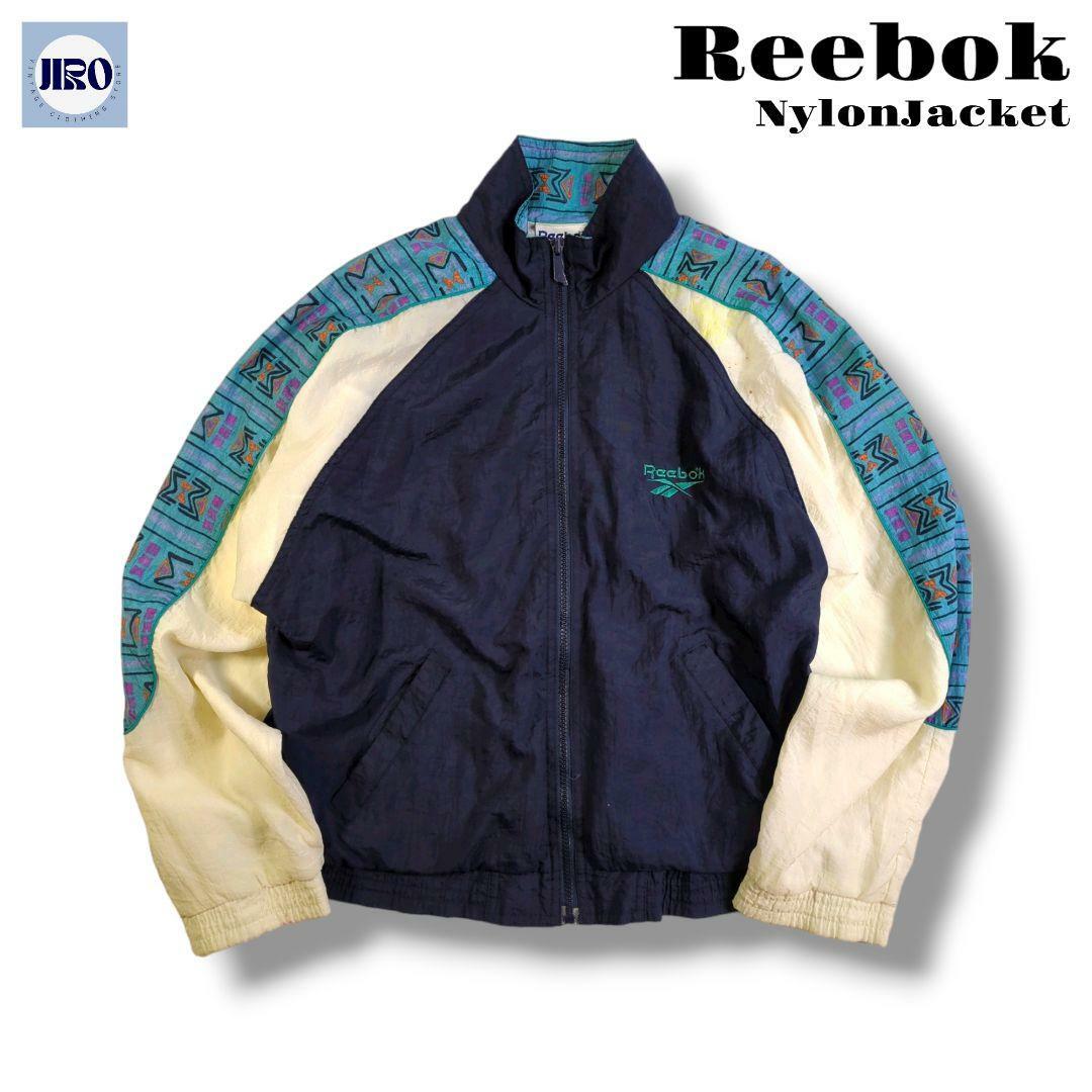 Reebok(リーボック)の90s リーボック Reebok ナイロンジャケット ネイビー M 130 メンズのジャケット/アウター(ナイロンジャケット)の商品写真