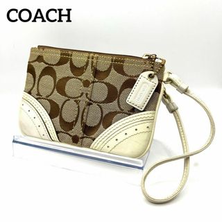 コーチ(COACH)のCOACH コーチ ポーチ リストレット カーキ 白 ジャガード レザー(ポーチ)