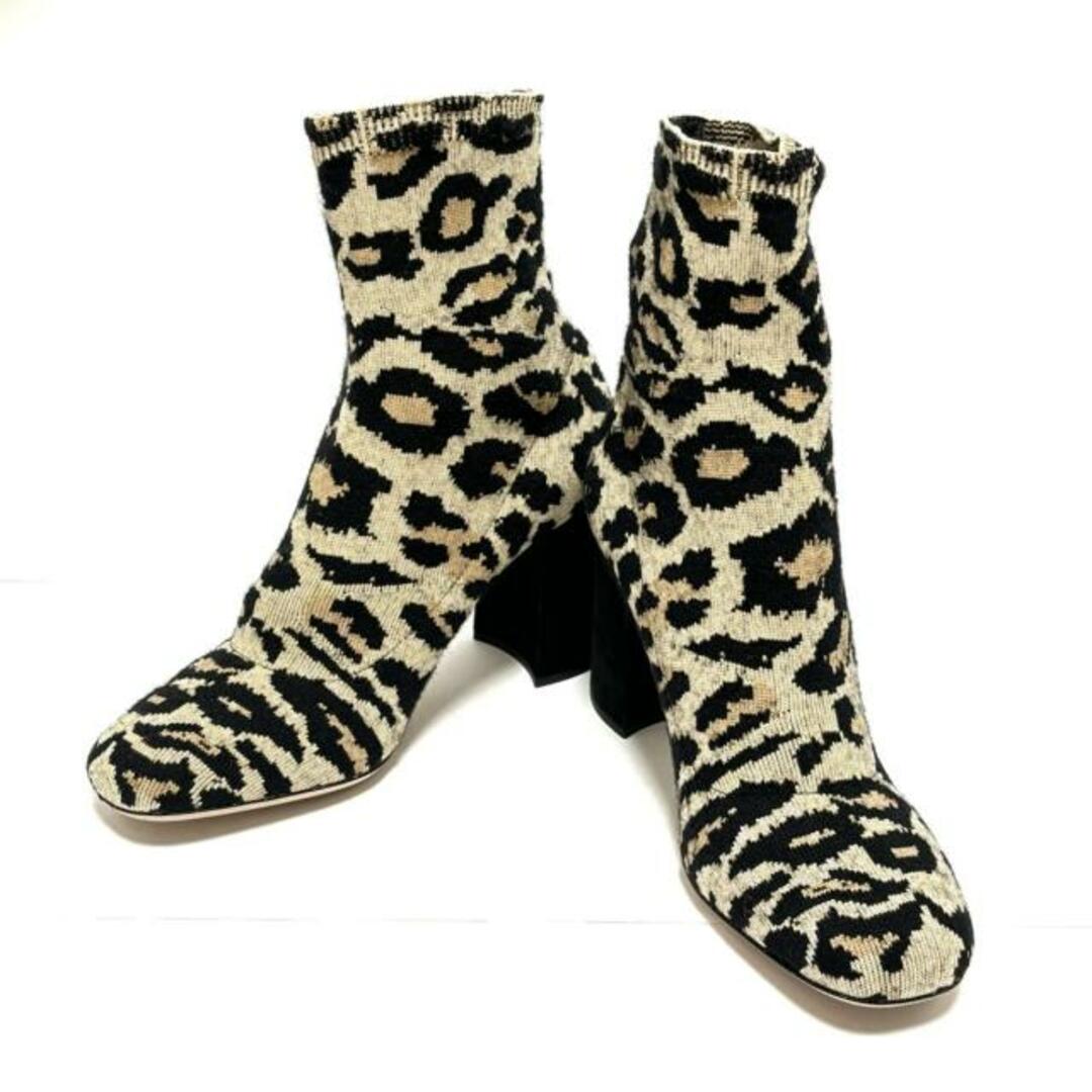 miumiu(ミュウミュウ)のmiumiu(ミュウミュウ) ショートブーツ 37 レディース美品  - アイボリー×黒×マルチ 豹柄 ウール×スエード レディースの靴/シューズ(ブーツ)の商品写真