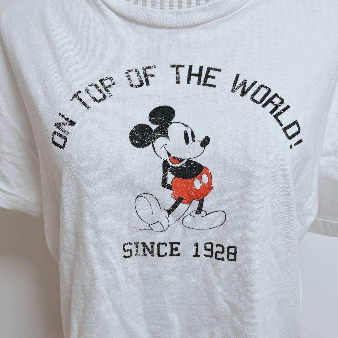 Disney(ディズニー)のディズニー　ミッキーTシャツ【M】ON TOP OF THE WORLD! レディースのトップス(Tシャツ(半袖/袖なし))の商品写真