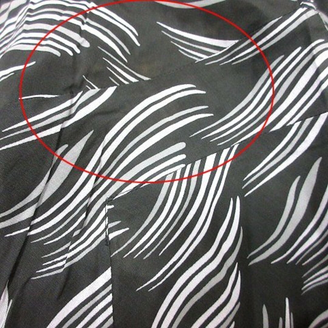 kumikyoku（組曲）(クミキョク)のクミキョク 組曲 フレアスカート ミモレ ロング 総柄 2 黒 ブラック /AU レディースのスカート(ロングスカート)の商品写真