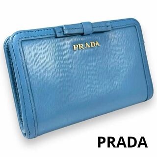 プラダ(PRADA)のプラダ 2つ折り財布 ヴィッテロムーブ リボン ブルー 水色 ロゴ 金 L字(財布)