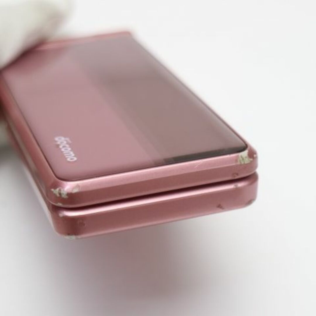 Panasonic(パナソニック)のP-01F ピンク 白ロム M222 スマホ/家電/カメラのスマートフォン/携帯電話(携帯電話本体)の商品写真