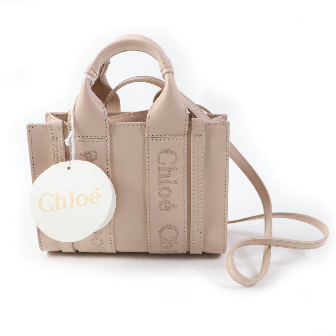 Chloe(クロエ)の未使用品 Chloe クロエ CHC23UP237I60615 WOODY Cement Pink スムースカーフスキン ロゴ入り ミニトートバッグ/ショルダーバッグ 保存袋付き イタリア製 レディース レディースのバッグ(ショルダーバッグ)の商品写真