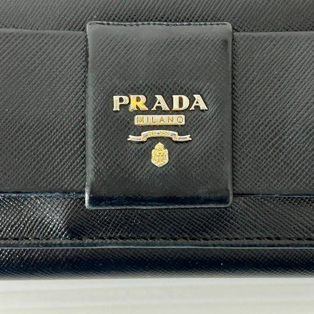 PRADA(プラダ)のPRADAプラダ 長財布 サフィアーノ フィオッコリボン　レザー ブラック レディースのファッション小物(財布)の商品写真