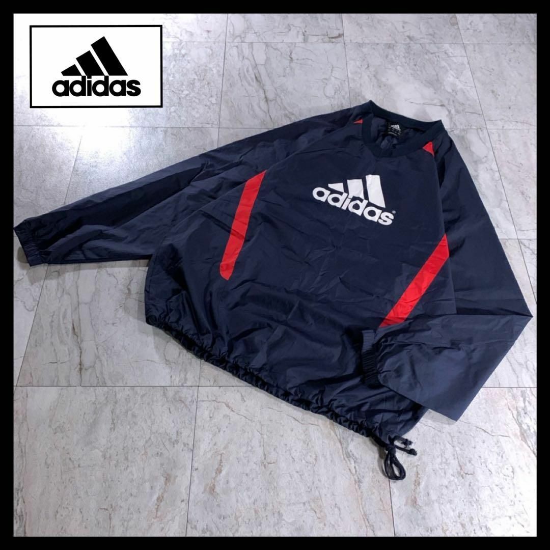 adidas(アディダス)の00s 古着 adidas ナイロン プルオーバー ピステ ネイビー 赤 L メンズのジャケット/アウター(ナイロンジャケット)の商品写真