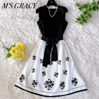 エムズグレイシー(M'S GRACY)の美品✨M'S GRACY 膝丈ワンピース　スパンコール　リボン　花　40 Ｌ(ひざ丈ワンピース)