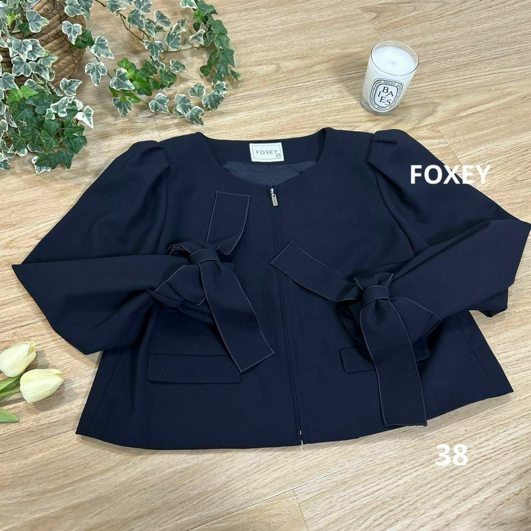 FOXEY(フォクシー)のFOXEY　フォクシー　袖口リボンジャケット　38　ミッドナイトブルー　羽織り レディースのジャケット/アウター(ノーカラージャケット)の商品写真